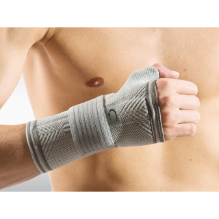 Omnimed Dynamic Manu bandaža za zapestje XS, ki se lahko nosi na obeh straneh