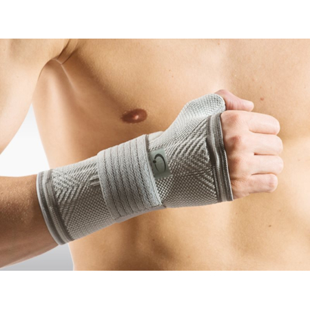 Omnimed Dynamic Manu bandaža za zapestje XS, ki se lahko nosi na obeh straneh