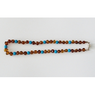 Amberstyle amber soother chain with light blue wooden beads